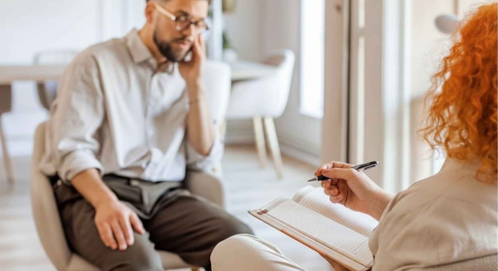 Man speaking openly with a counselor during a private session