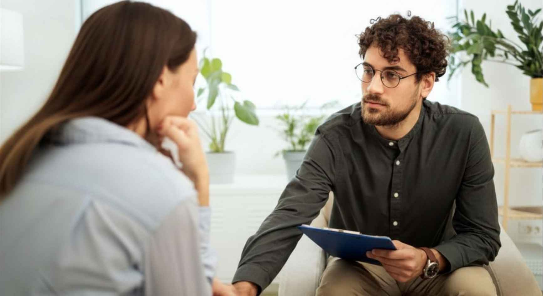 Professional listening to a client during a substance use counseling session