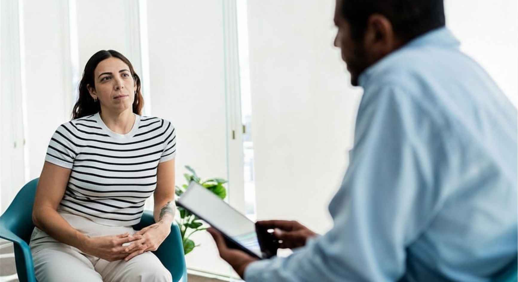 Woman sharing during a one-on-one counseling session with a professional